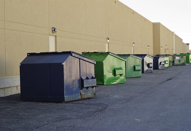 closed construction dumpster with a sign prohibiting unauthorized access in Deerfield